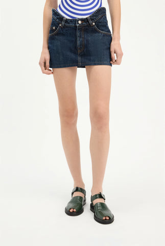 The Curved Denim Mini Skirt