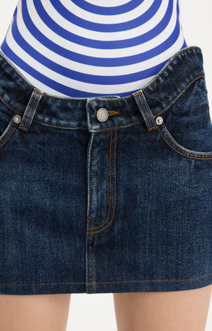 The Curved Denim Mini Skirt